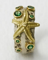 'Pierced Ring' with starfish and Tsavorites stones